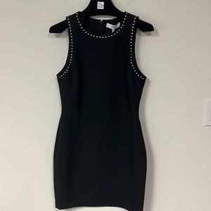 Likely “little black dress”